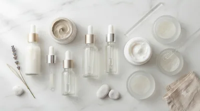 A clear acid treatment serum in an amber glass bottle on a dark stone surface, lit from the side