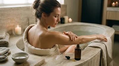Luxury body oil smoothed along the arm for glowing, nourished skin